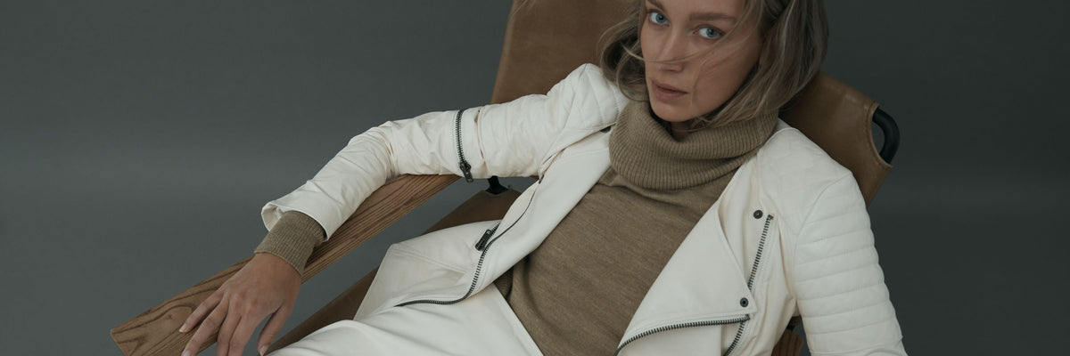 Most wanted at WEST 14TH: a white leather moto jacket worn with a camel knit