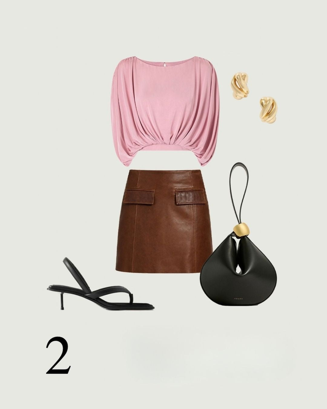Vintage Chocolate leather mini skirt flat lay styled for evening with a pink blouse, black heels and a sculptural bag.